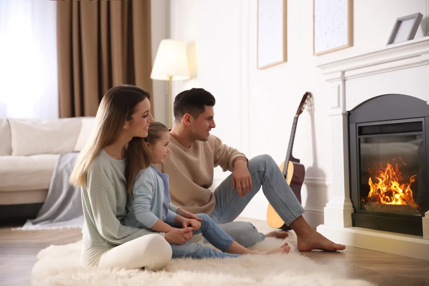 A family enjoying their fireplace at home in Southern Maryland