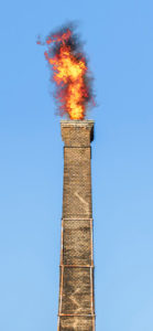 Old and dirty chimney catching on fire