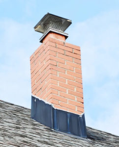 Older chimney on roof with damper on top